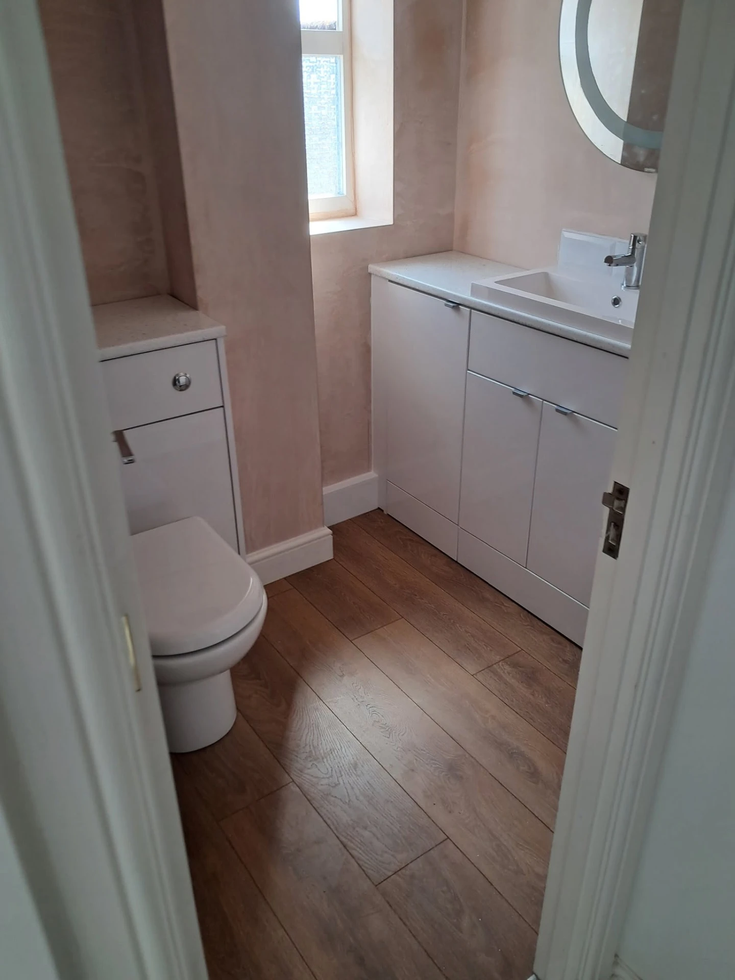 Cloakroom with fitted vanity unit and WC unit
